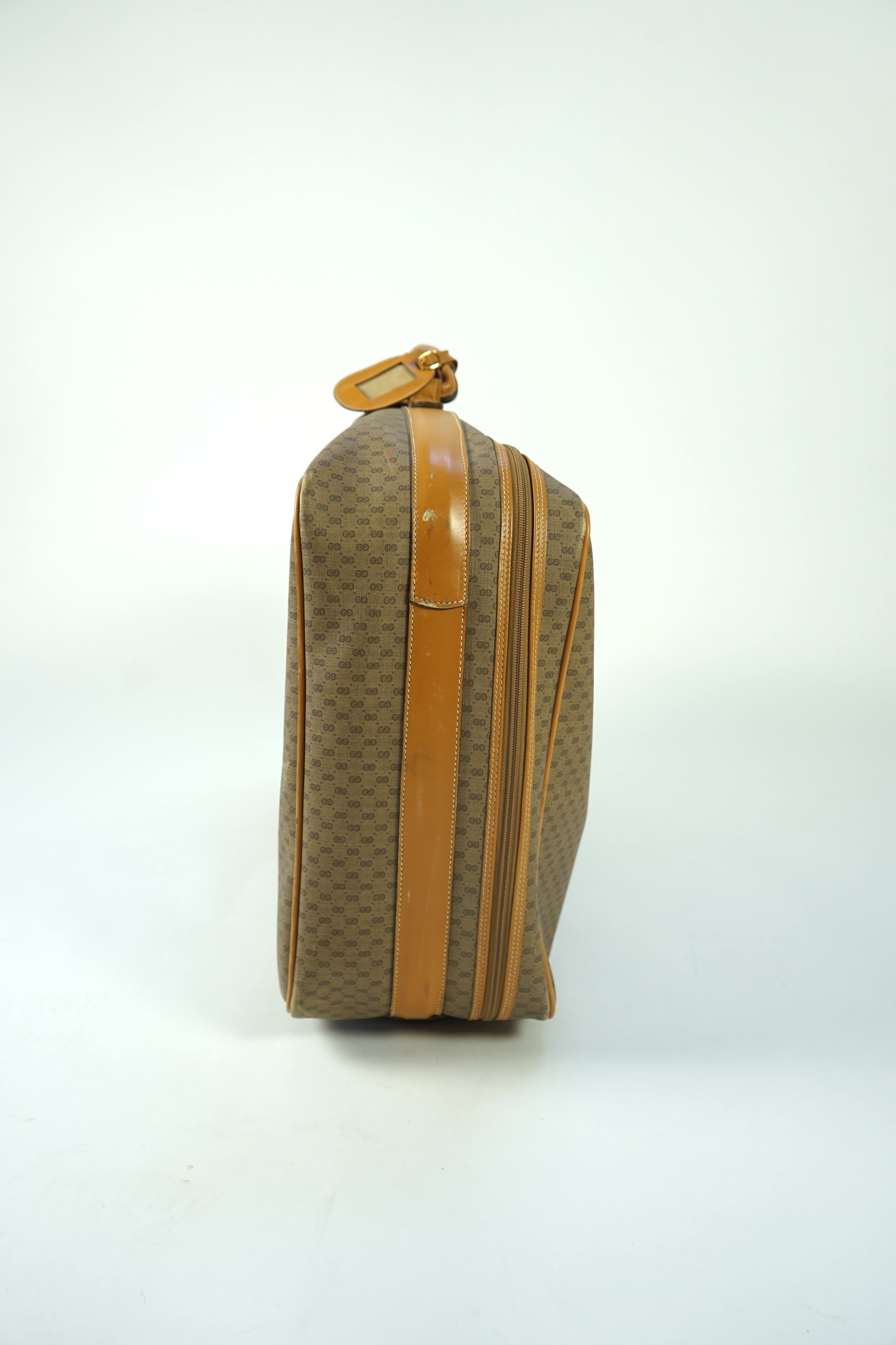 A vintage Gucci micro GG monogram canvas suitcase